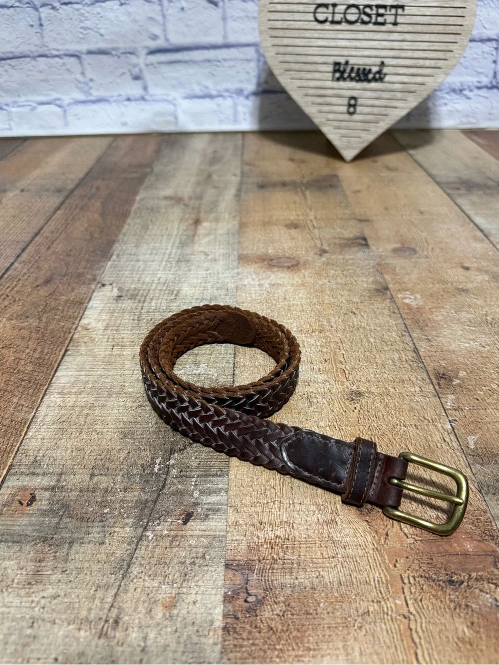 Brown leather braided belt size 31 with brass buckle